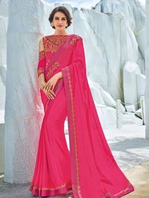 Look your ethnic best by wearing this Rani pink color two tone bright georgette saree. Ideal for party, festive & social gatherings. this gorgeous saree featuring a beautiful mix of designs. Its attractive color and designer heavy embroidered design, Flower zari design, stone work, heavy designer blouse, beautiful floral design work over the attire & contrast hemline adds to the look. Comes along with a contrast unstitched blouse.