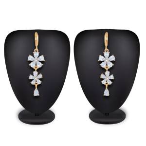 Rich And Elegant Looking Earrings Set Is Here In Golden Color Beautified With Diamonds. This Pretty Set Can Be Paired With Any Simple Or Heavy Attire. Buy Now.