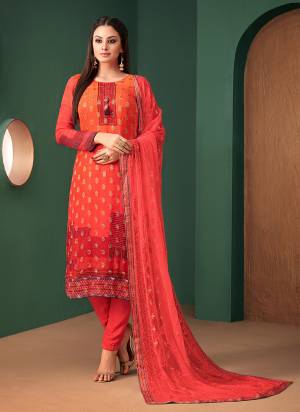 Orange And Red Color Induces Perfect Summery Appeal To Any Outfit, So Grab This Designer Straight Suit In Orange And Red Colored Top Paired With Red Colored bottom And Dupatta. Its Top Is Jacquard Georgette Fabricated Paired With Santoon Bottom And Chiffon Dupatta. 