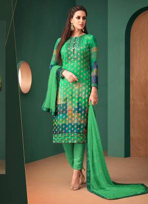 This Festive Season, Get A Traditional Look Wearing This Designer Straight Suit In Green Color. Its Top Is Fabricated On Jacquard Georgette Paired With Santoon Bottom And Chiffon Dupatta. All Its Fabrics Ensures Superb Comfort All Day Long. 