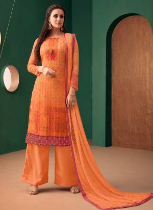 Orange Color Induces Perfect Summery Appeal To Any Outfit, So Grab This Designer Straight Suit In Orange Colored Top Paired With Orange Colored bottom And Dupatta. Its Top Is Jacquard Georgette Fabricated Paired With Santoon Bottom And Chiffon Dupatta. 
