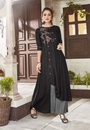 For A Bold And Beautiful Look, Grab This Designer Readymade Kurti In Black And Grey Color Fabricated On Viscose Rayon. This Kurti Has Skin Soft Fabric In Light Weight. Buy Now.