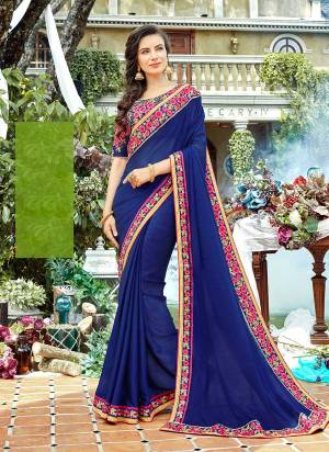 Bright Colors Gives a Refreshing Look To Your Personality, So Grab This Designer Saree In Royal Blue Color Paired With Royal Blue colored Blouse. This Saree Is Satin Georgette Based Paired With Art Silk Fabricated Blouse. It Has Heavy Embroidered Blouse With Embroidered Lace Border. 