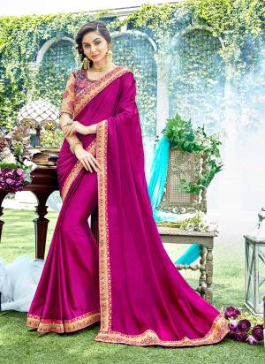 Catch All The Limelight Wearing This Designer Saree In Magenta Pink Color Paired With Purple And Beige Colored Blouse. This SareeIs Fabricated On Satin Georgette Paired With Art Silk Fabricated Blouse. Buy Now.