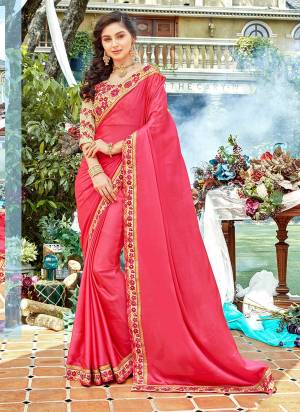 Shine Bright In This Designer Dark Pink Colored Saree Paired With Beige Colored Blouse. This Saree Is Fabricated On Satin Georgette Paired With Art Silk Fabricated Blouse. It Has Pretty Floral Work Over The Blouse And Saree Lace Border. 