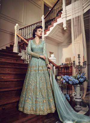 Very Pretty Looking Designer Indo-Western Suit Is Here In Light Blue Color Paired With Light Blue Colored Pant and Lehenga With Light Blue Dupatta. Its Top And Dupatta Are Net Fabricated Paired With Art Silk Pant And Lehenga. Buy This Designer Piece Now And Wear As Per The Occasion Pairing It With Pants Or Lehenga.