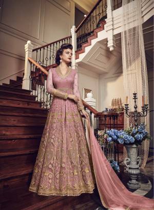 Very Pretty Looking Designer Indo-Western Suit Is Here In Blush Pink Color Paired With Blush Pink Colored Pant and Lehenga With Blush Pink Dupatta. Its Top And Dupatta Are Net Fabricated Paired With Art Silk Pant And Lehenga. Buy This Designer Piece Now And Wear As Per The Occasion Pairing It With Pants Or Lehenga.