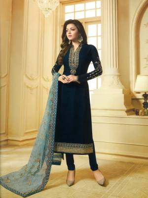 Enhance Your Beauty Wearing This Designer Straight Suit In Navy Blue Color Paired With Lovely Baby Blue Colored Dupatta. Its Top Is Fabricated On Georgette Satin Paired With Santoon Bottom And Net Fabricated Dupatta. Grab Now.