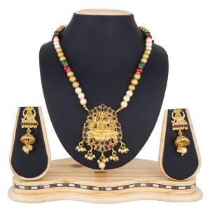 Add This Pretty Heavy Necklace Set In Golden Color. This Lovely Set Comes A Pair Of Earrings . It Can Be Paired With Any Colored Traditional Attire. Buy Now.