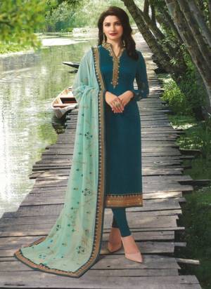 Here Is a Pretty Shade With  Designer Straight Suit In Teal Blue Color Paired With Aqua Blue Colored Dupatta. Its Top Is Georgette Satin Fabricated Paired With Santoon Bottom And Georgette Dupatta. Buy Now.