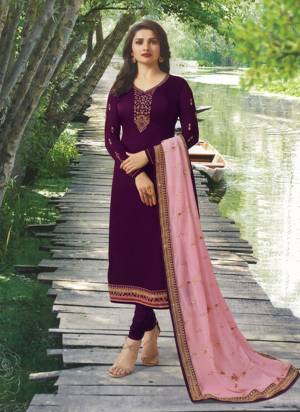 Look Pretty In This Designer Straight Suit In Wine Color Paired With Contrasting Pink Colored Dupatta. Its Embroidered Top Is Georgette Satin Based Paired With Santoon Bottom And Georgette Dupatta. All Its Fabric Are Light Weight And Easy To Carry All Day Long.