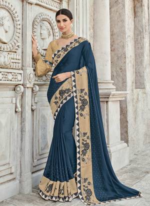 Change your wardrobe and get classier outfits like this gorgeous Prussianblue color two tone bright georgette saree. Ideal for party, festive & social gatherings. this gorgeous saree featuring a beautiful mix of designs. Its attractive color and designer heavy embroidered design, Flower embroidered and zari design, stone design border, beautiful floral design work over the attire & contrast hemline adds to the look. Comes along with a contrast unstitched blouse.