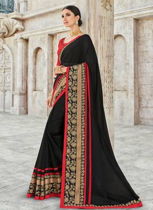 Show your elegance by wearing this gorgeous black color georgette saree. Ideal for party, festive & social gatherings. this gorgeous saree featuring a beautiful mix of designs. Its attractive color and designer heavy embroidered design, stone design all over the saree, beautiful floral design work over the attire & contrast hemline adds to the look. Comes along with a contrast unstitched blouse.