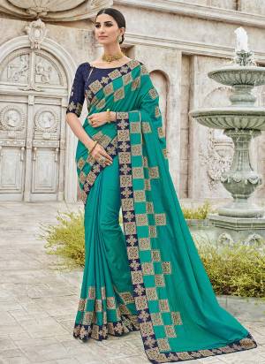 marvelously charming is what you will look at the next wedding gala wearing this beautiful Blue color two tone sana silk saree. Ideal for party, festive & social gatherings. this gorgeous saree featuring a beautiful mix of designs. Its attractive color and designer heavy embroidered design, amazing zari design, beautiful floral design work over the attire & contrast hemline adds to the look. Comes along with a contrast unstitched blouse.