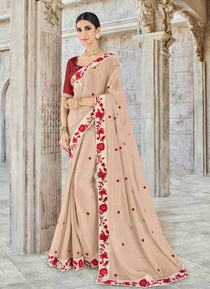 Bring out the best in you when wearing this beige color two tone bright georgette saree. Ideal for party, festive & social gatherings. this gorgeous saree featuring a beautiful mix of designs. Its attractive color and designer heavy embroidered design, designer beautiful heavy blouse, beautiful floral design work over the attire & contrast hemline adds to the look. Comes along with a contrast unstitched blouse.