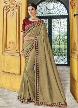 The fabulous pattern makes this saree a classy number to be included in your wardrobe. beige color two tone silk fabrics saree. Ideal for party, festive & social gatherings. this gorgeous saree featuring a beautiful mix of designs. Its attractive color and designer heavy embroidered design, Flower zari design, stone design, beautiful floral design work over the attire & contrast hemline adds to the look. Comes along with a contrast unstitched blouse.