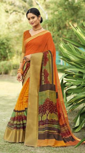 For Your Casual Or Semi-Casual Wear, Grab This Pretty Saree In Orange Paired With Orange Colored Blouse. This Lovely Saree And Blouse Are Fabricated On Cotton Silk Beautified With Prints All Over It. It Is Easy To Drape And Also Durable. 