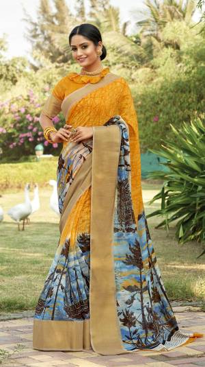 This Festive Season Look Pretty And Elegant With This Saree In Musturd Yellow Color Paired With Musturd Yellow Colored Blouse. This Saree And Blouse Are Fabricated On Cotton Silk Beautified With Prints All Over It. It Is Light In Weight Which Also Ensures a Superb Comfort To Enjoy The Fest. Buy Now.
