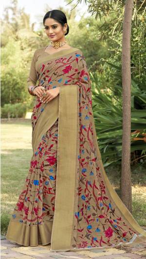 For Your Casual Or Semi-Casual Wear, Grab This Pretty Saree In Beige Paired With Beige Colored Blouse. This Lovely Saree And Blouse Are Fabricated On Cotton Silk Beautified With Prints All Over It. It Is Easy To Drape And Also Durable. 