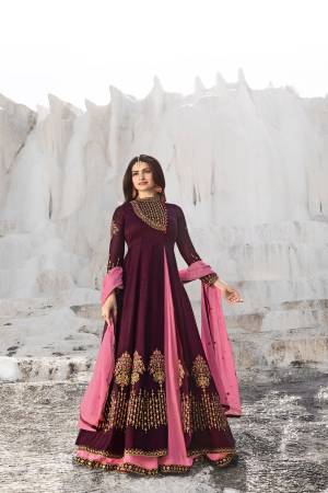 You Will Definitely Earn Lots Of Compliments Wearing This Heavy Designer Suit In Wine And Pink Color Paired With Pink Colored Bottom And Dupatta. Its Top Is Fabricated On Georgette And Art Silk Paired With Santoon Bottom And Georgette Dupatta.  Buy Now.