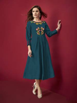 Grab This Beautiful Designer Readymade Kurti In Blue Color Fabricated on Rayon. It Is Beautified With Resham Work And Available In All Regular Sizes. 