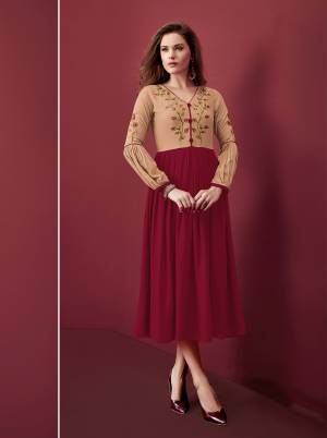 Look Pretty In This Designer Readymade Kurti In Maroon And Beige Color Fabricated On Rayon. It Is Beautified With Resham Embroidery Over The Yoke. 