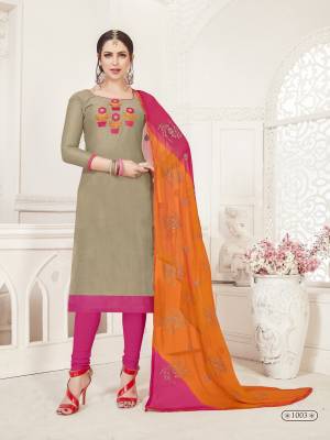 Lovely Color Pallete Is Here With This Dress Material In Grey Colored Top Paired With Rani Pink Bottom And Orange And Rani Pink Dupatta. Its TopIs Silk Based Paired With Cotton Bottom And Chiffon Dupatta. Buy Now.