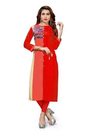 Be It Your College, Home Or Work Place, This kurti Is Suitable For All. This Pretty Red And Peach Colored Kurti Is Fabricated On Rayon Beautified With Printed Patch And Buttons. 