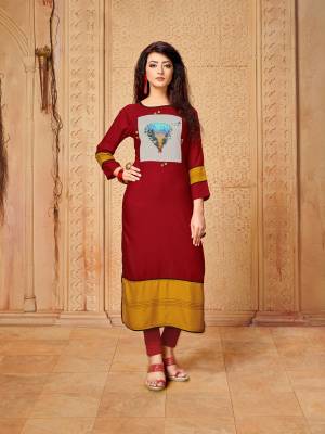 Add Some Casuals With This Pretty Kurti In Maroon Color Fabricated On Rayon. It Is Available In All Regular Sizes Beautified With Printed Patch. 