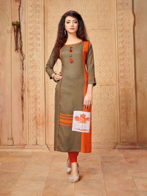 Simple And Elegant Looking Readymade Kurti Is Here In Beige Color Fabricated On Rayon. It Is Soft Towards Skin And Easy To Carry All Day Long. 