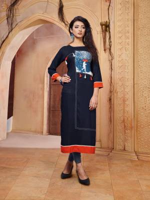 Enhance Your Personality Wearing This Readymade Kurti In Navy Blue Color Fabricated On Rayon. It Is Light In Weight And Easy To Carry All Day Long. 