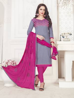 Flaunt Your Rich And Elegant Taste Wearing This Suit In Grey Colored Top Paired With Contrasting Rani Pink Colored Bottom And Dupatta. Its Top And Bottom Are Cotton Based Paired With Chiffon Duapatta. 