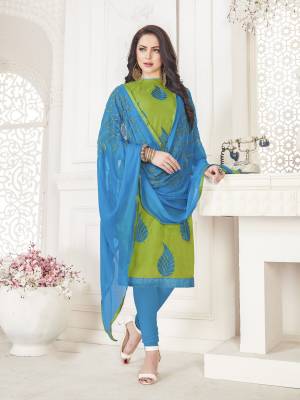 Cool Color Pallete Is Here With This Dress Material In Green Colored Top Paired With Contrasting Turquoise Blue Colored Bottom And Dupatta. Its Top And Bottom Are Cotton Based Paired With Chiffon Dupatta. Its Fabric Ensures Superb Comfort All Day Long. 