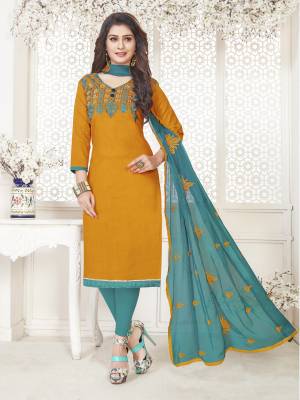 For Youe Semi-Casuals, Grab This Pretty Dress Material In Musturd Yellow Colored Top Paired With Contrasting Turquoise Blue Colored Bottom And Dupatta. Ithis Dress Material In Cotton Based Paired With Chiffon Dupatta. Buy Now.