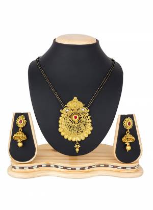 Grab This Heavy Mangalsutra Set In Golden Color Which Comes With A Pair Of Earrings, Also It Can Be Paired With Colored Ethnic Attire. Buy Now.