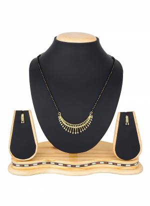 To Give An Elegant Look To Your Neckline, Grab This Pretty Elegant Looking Mangalsutra Set In Golden Color Beautified With Diamond Work All Over. It Can Be Paired With Any Colored Attire. Buy Now.