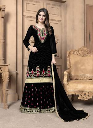 This Festive Season, Adorn A Lovely Look Wearing This Designer Sharara Suit In Black Color. Its Top And Bottom Are Georgette Based Paired With Chiffon Dupatta. Its Top And Bottom Are Beautified With Heavy Embroidery. Buy Now.