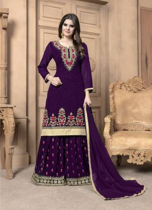 This Festive Season, Adorn A Lovely Look Wearing This Designer Sharara Suit In Purple Color. Its Top And Bottom Are Georgette Based Paired With Chiffon Dupatta. Its Top And Bottom Are Beautified With Heavy Embroidery. Buy Now.