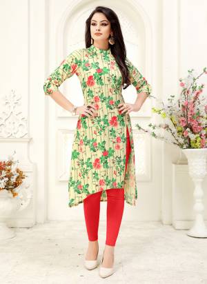For Your Casual Or Semi-Casuals, Grab This Readymade Kurti In Cream And Green Color Fabricated On Crepe. It Is Beautified With Attractive Floral Prints. 