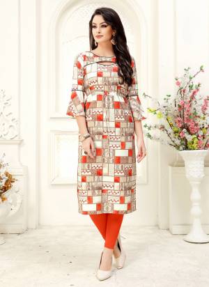 Here Is A Pretty Checkered Kurti In Beige And Orange Color Fabricated On Crepe. This Kurti Has Checks Prints All Over And It Is Available In All Regular Sizes. 