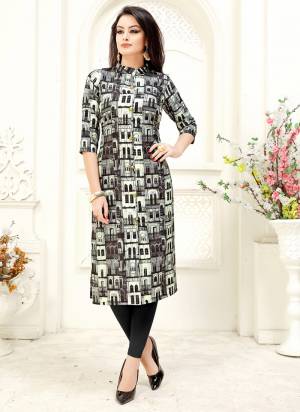 You Will Earn Lots Of Compliments Wearing This Readymade Kurti In Black And White Color Fabricated Crepe. This Kurti Has Pretty Prints All Over With All Available Sizes. 