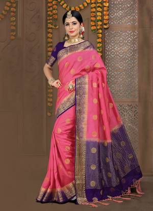Look Pretty Wearing this Silk Based Saree In Pink Color Paired With Contrasting Purple Colored Blouse. This Saree And Blouse Are Fabricated On Linen Silk Beautified With Weave. This Rich Fabric Gives An Elegant Look To Your Personality. 