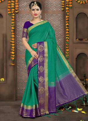 Celebrate This Festive Season Wearing This Pretty Sea Green colored Saree Paired With Contrasting Violet Colored Blouse. This Saree And Blouse Are Fabricated On Rich Linen Silk Which Earn You Lots Of Compliments From Onlookers. 