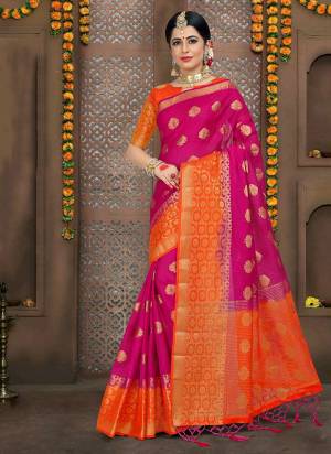 Bright And Visually Appealing Color Is Here With This Saree In Rani Pink Color Paored With Contrasting Orange Colored Blouse. This Saree And Blouse Are Fabricated On Linen Silk.