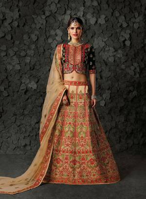 Rich Combination Is Here With This Heavy Designer Lehenga Choli In Dark Green Colored Blouse Paired With Beige Colored Lehenga And dupatta. Its Blouse Is Fabricated On Velvet Paired With Art Silk Lehenga And Net Dupatta. All Its Fabrics Ensures Superb Comfort All Day Long. Buy Now.