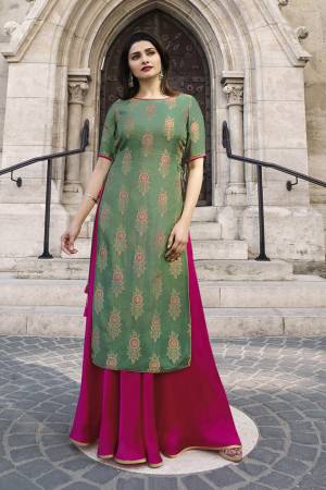 This Festive Seson, Look The Most Unique Of all Wearing This Designer Readymade Long Kurti In Mint Green And Rani Pink Color. This Pretty Kurti Is Fabricated On Jacquard Silk And Satin. This Lovely Combination Of Color and Fabric Will earn You Lots Of Compliments From Onlookers.