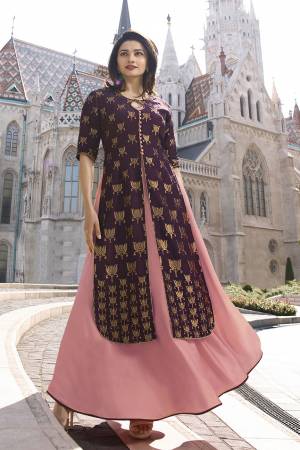 Look Pretty In This Lovely Designer Long Kurti In Purple And Pink Color. It Is Fabricated On Jacqurd Silk And Satin. It Has Beautiful Weave Over The Top With Stone Work. Also It Is Available In All Regular Sizes. 