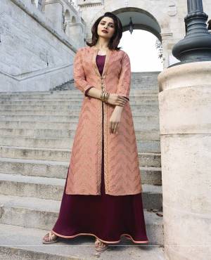 Look Pretty In This Lovely Designer Long Kurti In Light Pink And Wine Color. It Is Fabricated On Jacqurd Silk And Satin. It Has Beautiful Weave Over The Top With Stone Work. Also It Is Available In All Regular Sizes. 