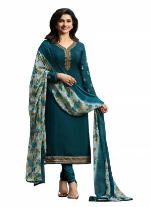 Grab This Beautiful Designer Straight Suit In New Shade Of Blue. Its Top And Bottom Are In Teal Blue Color Paired With Light Blue Colored Dupatta. Its Top And Bottom Are Fabricated On Crepe Paired With Chiffon Printed Dupatta. Buy Now.