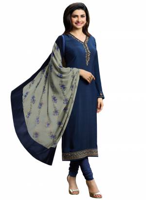 Enhance Your Personality In This Elegant Color Pallete With This Designer Straight Suit In Navy Blue Color Paired With Contrasting Grey Colored Dupatta. Its Top And Bottom Are Fabricated On Crepe Paired With Chiffon Dupatta. All Its Fabrics Ensures Superb Comfort All Day Long. 